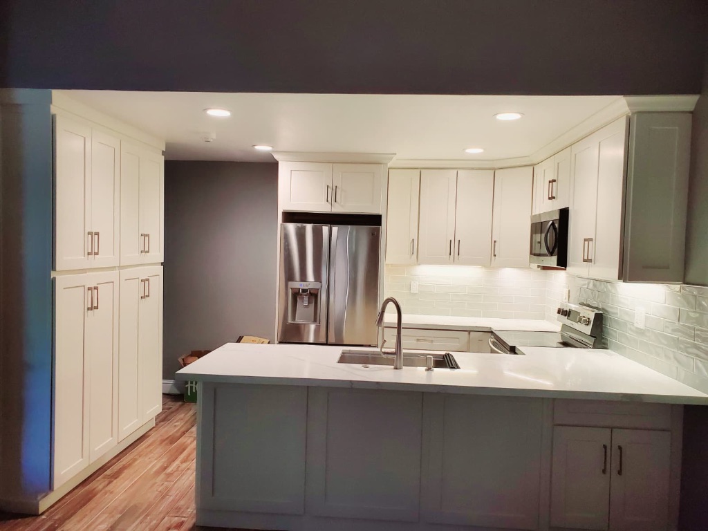 Full kitchen remodel with white cabinets