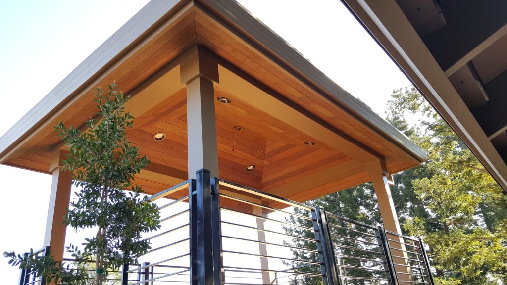Covered patio with cedar ceiling and recessed lighting