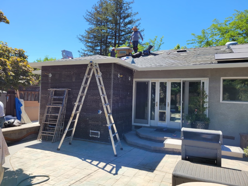 Room addition with stucco exterior