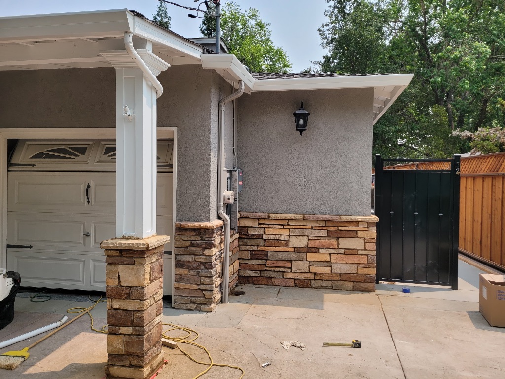 Stone veneer and gate work